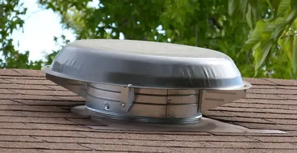 attic fan installation services with low-profile roof ventilation unit in Evansville, IN
