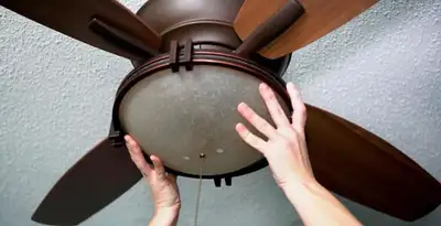 Ceiling fan repair and reinstallation on ceiling mount in Evansville, IN