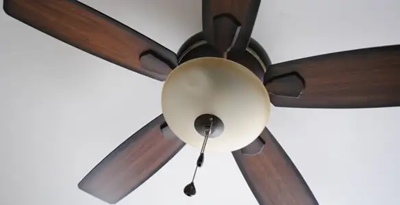 Fully installed ceiling fan with balanced blades and light fixture in Evansville, IN