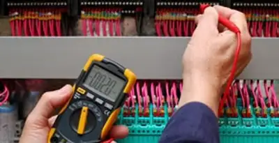 electrical service showing professional testing and troubleshooting of electrical panel by licensed electricians in Evansville, IN