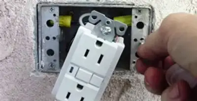 gfci circuits service showing installation of a ground fault circuit interrupter outlet by licensed electricians in Evansville, IN