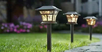 landscape lighting installation services with professionally installed pathway lights in Evansville, IN