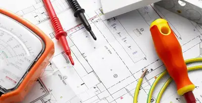 licensed electrician planning and testing electrical systems using professional tools in Evansville, IN