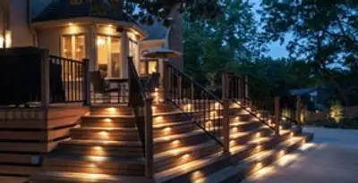 Residential electrician installing outdoor lighting for home safety in Evansville, IN