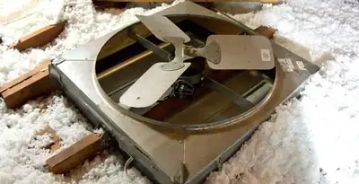 whole house fan installation services with attic-mounted ventilation unit in Evansville, IN